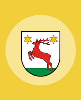 herb gminy Łysomice na żółtym tle